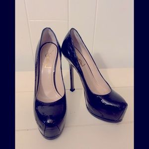 Yves Saint Laurent  Black Patent Leather Tribute Platform Pumps.